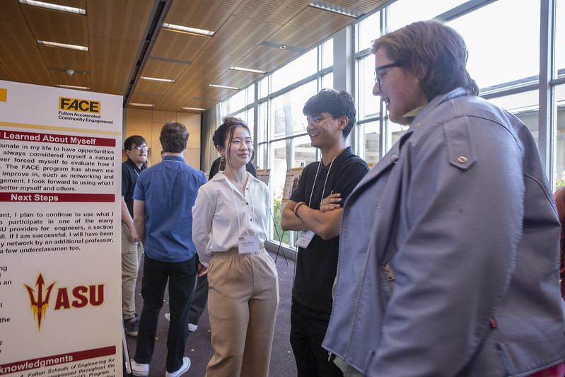 Student participants of FACE presenting at the annual symposium