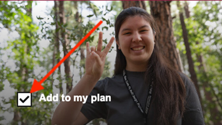 Screenshot of a check card with a red arrow indicating where to check the box.