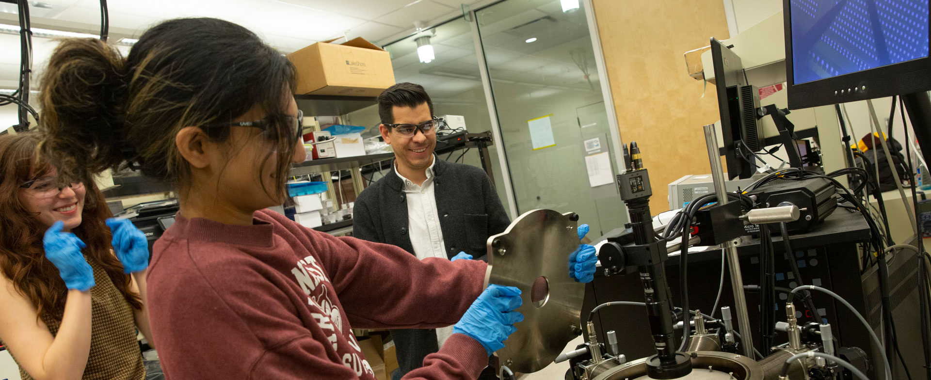 FURI student Priyanka Ravindran reconfigures a machine which uses layers of 2D materials in neuromorphic or “brain-inspired” computing operation.